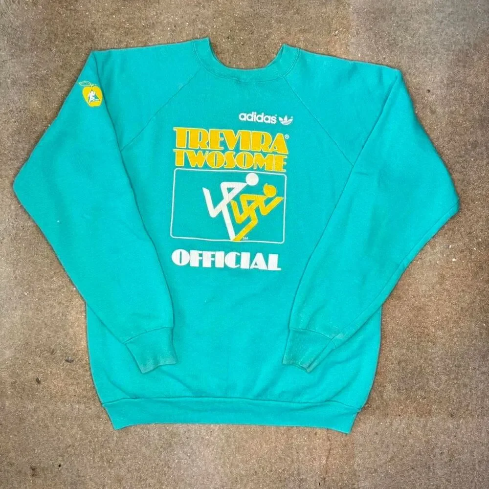Vintage Adidas Trevira crewneck in teal‎ with bold graphic. Made in USA